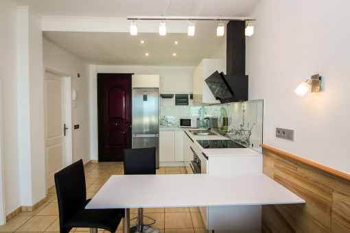 Open kitchen with dining area